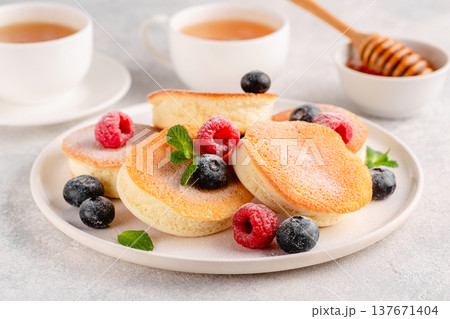 Japanese soft pancakes with berries Japanese soft pancakes with berries 137671404