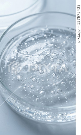 Transparent Hyaluronic Hair Serum Gel with Suspended Bubbles Macro Transparent Hyaluronic Hair Serum Gel with Suspended Bubbles Macro 137673435