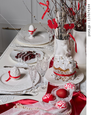 Decorative eggs brunch. Festive table setting with eggs and desserts 137674344