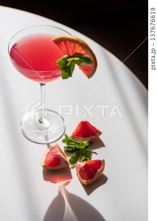 Martini Fiero Cocktail with Grapefruit and Mint. Vibrant Aperitif 137676619