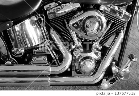 V-configuration engine with chrome parts and tubes. Chrome plating v-type motorcycle engine detailed V-configuration engine with chrome parts and tubes. Chrome plating v-type motorcycle engine detailed 137677318