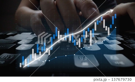 Hands Typing on Keyboard with Data Chart Overlay Representing Financial Growth, Investment, and Trading in Digital Management Systems Copula 137679730