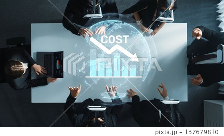 Aerial View of Business Meeting with Digitally Enhanced Graph Displaying Cost Reduction and Team Collaboration in Modern Office Environment. Raster 137679810