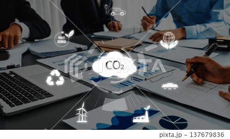 Team Meeting Focused on Sustainability and Carbon Reduction Strategies with Visual Data Representations and Eco-Friendly Icons. Raster 137679836