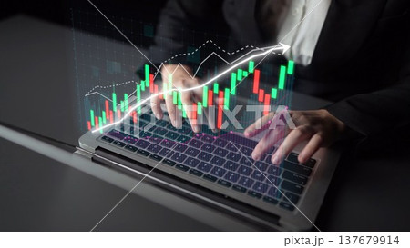 Business Professional Analyzing Financial Data on Laptop with Stock Market Graphs and Charts Representing Growth and Trends in a Modern Workspace Copula Business Professional Analyzing Financial Data on Laptop with Stock Market Graphs and Charts Representing Growth and Trends in a Modern Workspace Copula 137679914