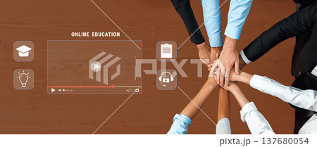Collaboration and Teamwork in Online Education with Diverse Hands on Table Surrounded by Digital Learning Icons Trope Collaboration and Teamwork in Online Education with Diverse Hands on Table Surrounded by Digital Learning Icons Trope 137680054