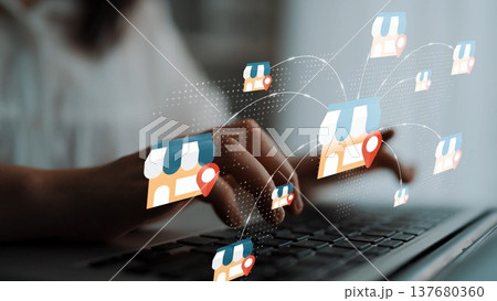 Digital Business Networking and Online Marketing Concepts with Store Icons on Laptop Keyboard for E-commerce Success and Growth Strategies Gluon 137680360