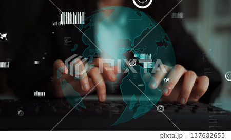 Hands typing on a keyboard with a digital globe overlay, showcasing global connectivity and technology in a modern workspace environment xenic Hands typing on a keyboard with a digital globe overlay, showcasing global connectivity and technology in a modern workspace environment xenic 137682653