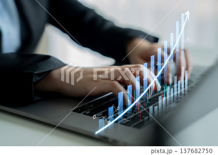 Business professional typing on laptop with financial growth graph overlay, showing data analysis and success in digital market trends Scalp Business professional typing on laptop with financial growth graph overlay, showing data analysis and success in digital market trends Scalp 137682750