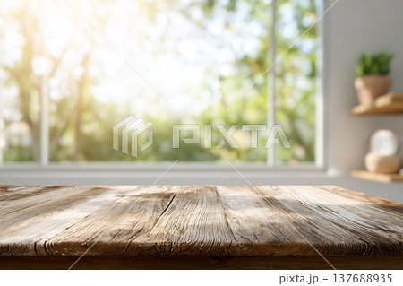 自然光が差し込む室内と木製テーブルの背景素材（コピースペース） 137688935