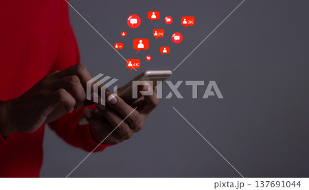 Love And Comment Social Media Concept, Young Man hand using smart phone mobile, with Social Media, on soft blurred background 137691044