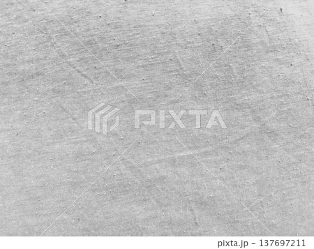 subtle light gray cotton fabric texture with diagonal wrinkle ideal for minimalist wallpaper or web design background 137697211