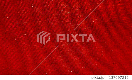 close up crimson knitted fabric texture speckled with subtle white fibers evoking cozy warmth for winter wallpaper or festive banner background close up crimson knitted fabric texture speckled with subtle white fibers evoking cozy warmth for winter wallpaper or festive banner background 137697213