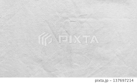 crisp white linen fabric texture closeup with subtle folds evoking serene minimalism for wallpaper or banner copy space crisp white linen fabric texture closeup with subtle folds evoking serene minimalism for wallpaper or banner copy space 137697214