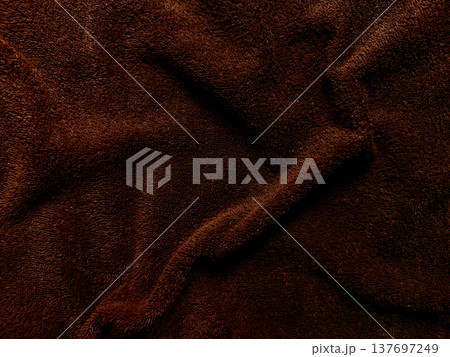 deep chocolate brown plush terry fabric texture with soft folds for web background or branding 137697249