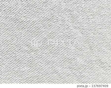 closeup light gray denim fabric texture diagonal twill weave pattern subtle tones minimal composition for wallpaper banner 137697409