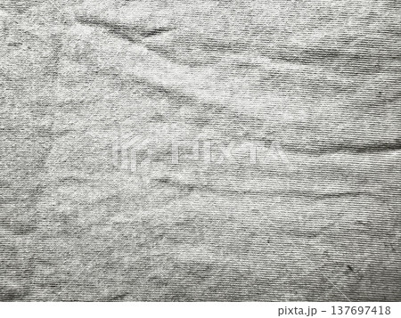 wrinkled gray ribbed fabric texture closeup minimalist neutral background for wallpaper and design banners wrinkled gray ribbed fabric texture closeup minimalist neutral background for wallpaper and design banners 137697418