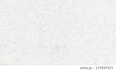 subtle white paper texture background with fine grain and soft highlights evoking serene minimalism for wallpaper or banner with copy space 137697425