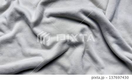 soft gray fleece texture unfolds in subtle waves evoking calm minimalism perfect for serene wallpaper or neutral banner backdrop soft gray fleece texture unfolds in subtle waves evoking calm minimalism perfect for serene wallpaper or neutral banner backdrop 137697430