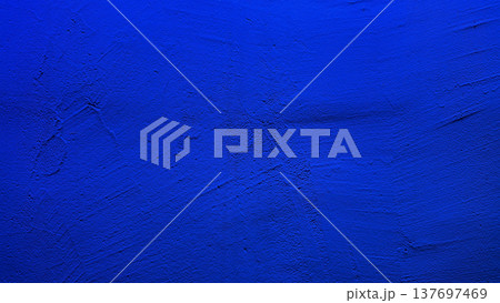vibrant ultramarine blue textured wall abstract background with subtle brush strokes evoking serene depth for digital wallpaper and banner copy space 137697469