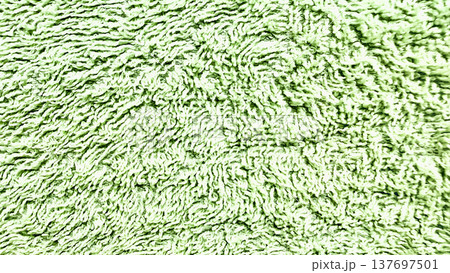 lush mint green fluffy towel texture closeup serene background for spa wallpaper or wellness banner with copy space 137697501