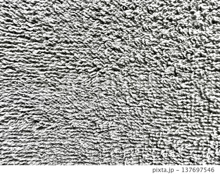 soft grey textured fabric surface with dense looped fibers for modern web design, branding, print background, and digital layout detail in minimalist tactile aesthetic 137697546