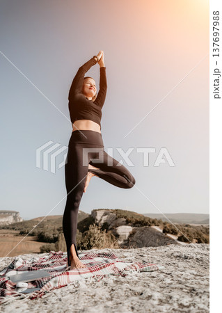 Yoga on a Mountaintop: A Moment of Peace and Balance Yoga on a Mountaintop: A Moment of Peace and Balance 137697988