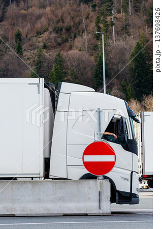 Health risks and smoking ban for truck drivers at parking area Health risks and smoking ban for truck drivers at parking area 137698426