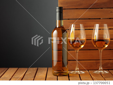 White wine on a wooden background. White wine on a wooden background. 137700051