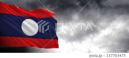 National flag of Laos with dark clouds, 3D rendering. 137703475
