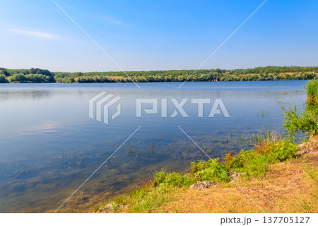 Summer landscape with beautiful river, green trees and blue sky Summer landscape with beautiful river, green trees and blue sky 137705127