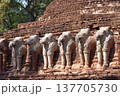 Ancient ruins Buddhist pagoda is decorated with elephant statues all around. 137705730
