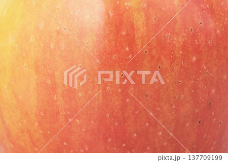 Texture of a red apple as a background macro photo. 137709199