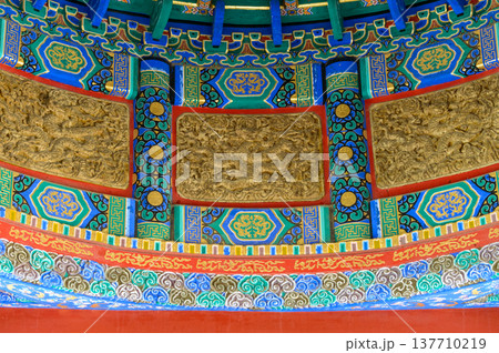 Colorful chinese temple ceiling with gilded relief panels Colorful chinese temple ceiling with gilded relief panels 137710219