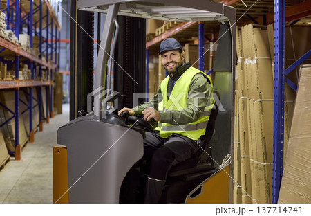 Warehouse forklift operator moving pallets on racking for streamlined logistics Warehouse forklift operator moving pallets on racking for streamlined logistics 137714741