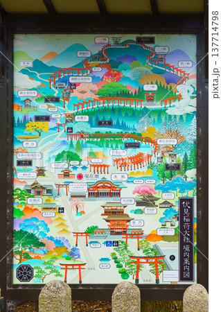 Kyoto, Japan - Sep 23 2024, A close-up view of the detailed colorful map of the Fushimi Inari Temple grounds with captions to various parts of the temple, Kyoto, Japan Kyoto, Japan - Sep 23 2024, A close-up view of the detailed colorful map of the Fushimi Inari Temple grounds with captions to various parts of the temple, Kyoto, Japan 137714798