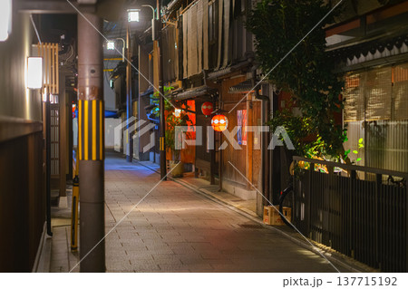 Kyoto, Japan - Sep 23 2024, Panoramic view of a quiet narrow street in Gion tea house district, Geisha street, without people, at night with street light, Kyoto, Japan Kyoto, Japan - Sep 23 2024, Panoramic view of a quiet narrow street in Gion tea house district, Geisha street, without people, at night with street light, Kyoto, Japan 137715192