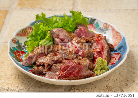 メガネ炙り焼き 炭火で香ばしく焼いた希少部位の肉料理 メガネ炙り焼き 炭火で香ばしく焼いた希少部位の肉料理 137716051