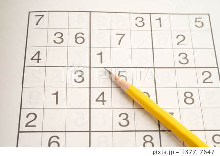 Sudoku puzzle, game to play for keep you brain younger for developing Alzheimer disease in senior patient. 137717647