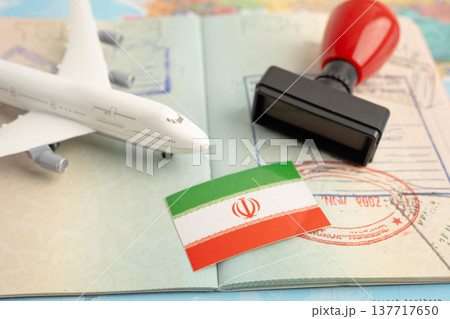 Iran flag and passport with airplane for travel. 137717650