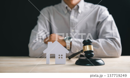 Foreclosure house concept with judge gavel, representing property law, real estate bankruptcy, mortgage debt, home auction, estate sale, legal division, attorney counsel 137719249