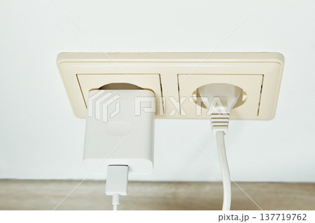 Electrical power outlet with charger and power plug supplying energy 137719762