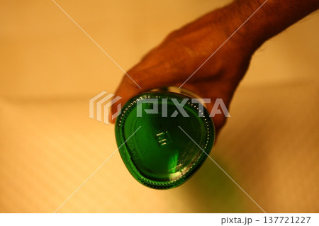 Empty Color Glass Bottle on the table Empty Color Glass Bottle on the table 137721227