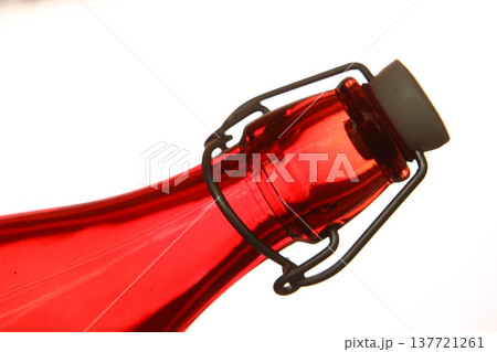 Empty Color Glass Bottle on the table Empty Color Glass Bottle on the table 137721261
