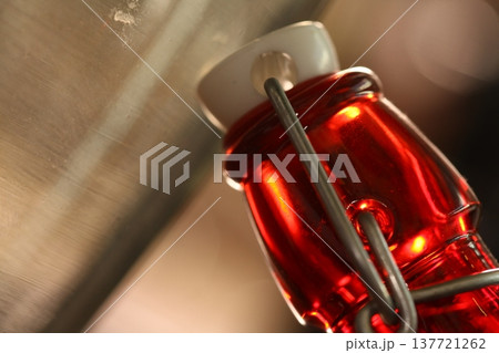 Empty Color Glass Bottle on the table Empty Color Glass Bottle on the table 137721262