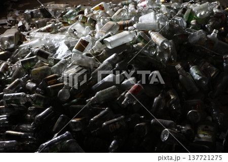 Empty Color Glass Bottle on the table Empty Color Glass Bottle on the table 137721275