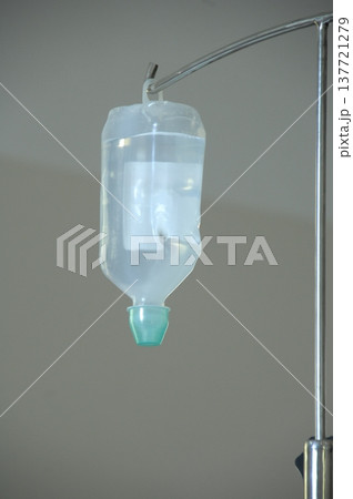 Empty Color Glass Bottle on the table 137721279