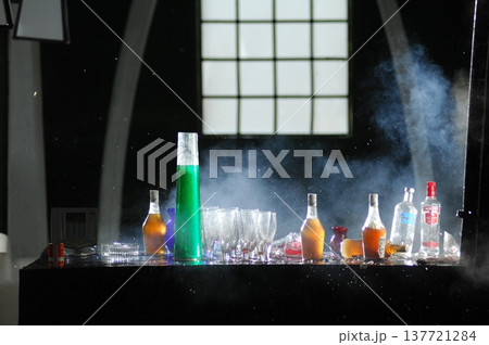 Empty Color Glass Bottle on the table Empty Color Glass Bottle on the table 137721284