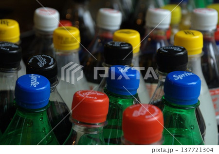 Empty Color Glass Bottle on the table 137721304