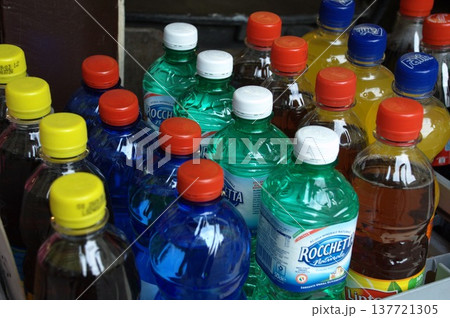 Empty Color Glass Bottle on the table Empty Color Glass Bottle on the table 137721305